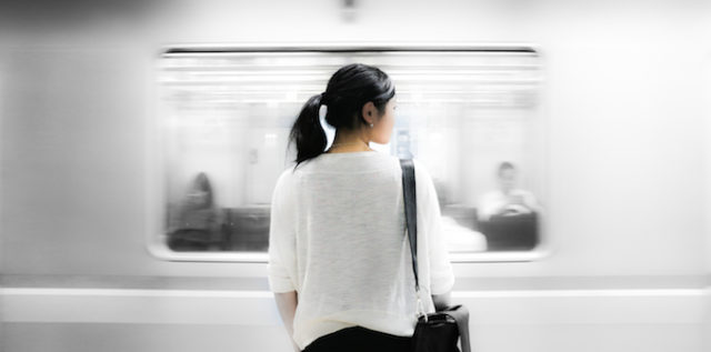 woman waiting for a train